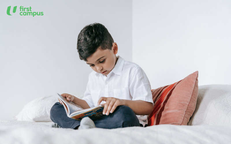 More efforts are needed to foster a love for reading - a study shows Singaporean students read for academic reasons and not for leisure. The image shows a young boy reading a book in bed.