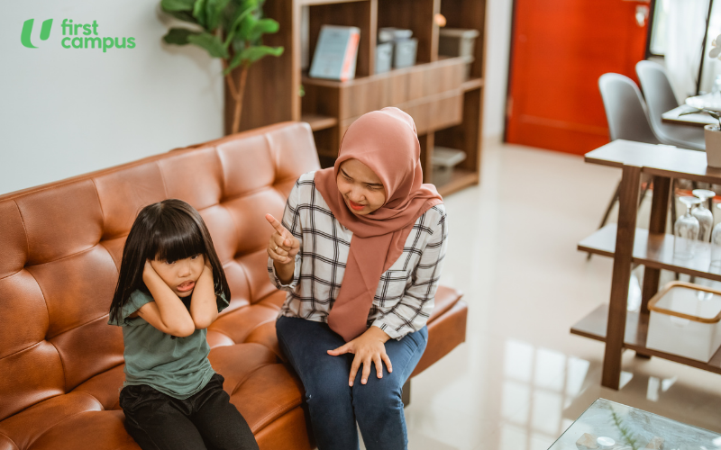 How to calm a toddler and how to stop a toddler from screaming - image shows a mother scolding a young girl covering her ears